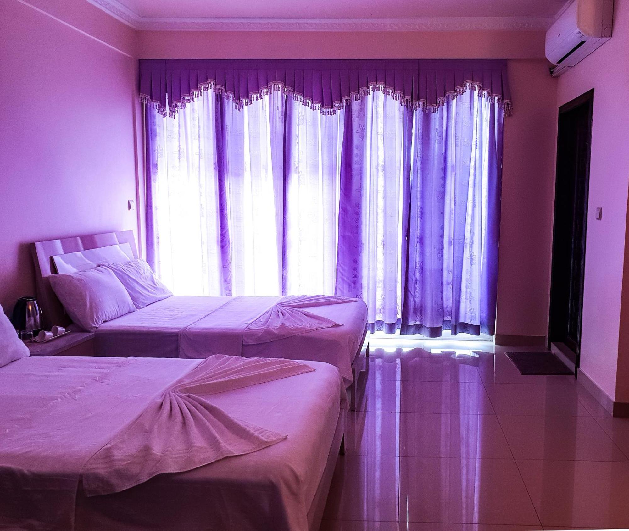 Reef Guest House Male Room photo